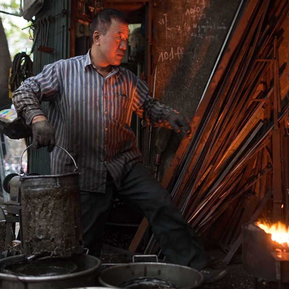 Portrait photography of the last remaining blacksmith on Hanoi’s Lo Ren Street. Photography | Vietnam binhdang.me portrait photography the last blacksmith in hanoi